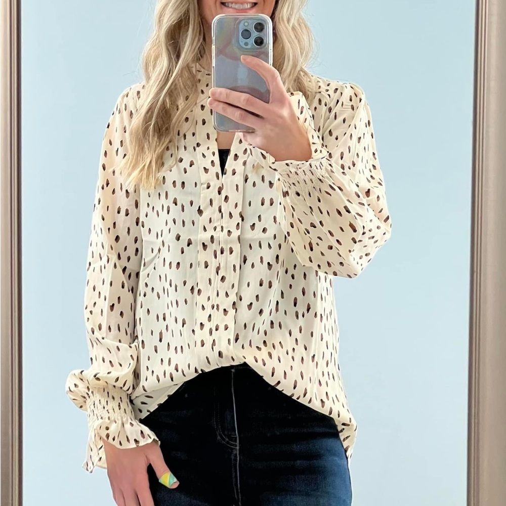 Off-white patterned blouse